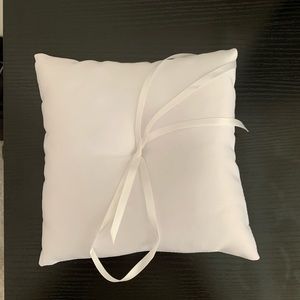 White ring bearer pillow for wedding